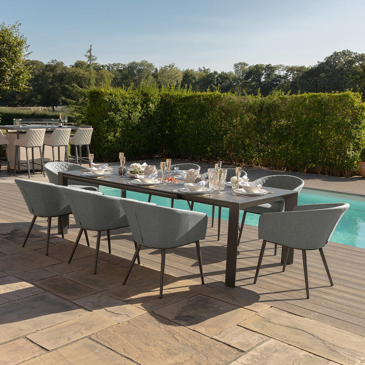 Ambition 6-10 Seat Universal Extending Dining Table with 10 Chairs